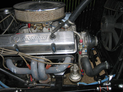 The Engine The small block Chevy Note the new steering column running 