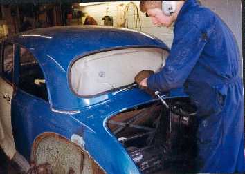 Using air chisel to cut rear of roof