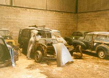 Van in a barn.