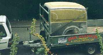 Van back on trailer after blasting.