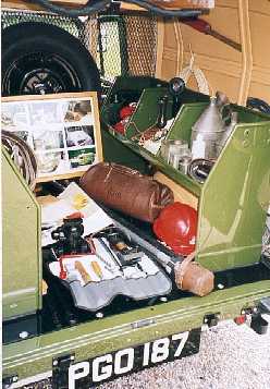 The van back full of tools.