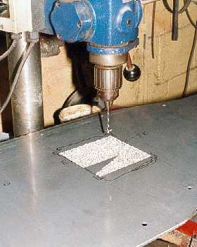 Cutting a recess in the floor.