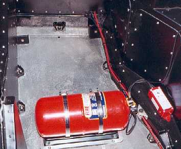 The plumbed in fire extinguisher.