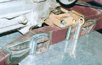 Combined seat, floor and harness mount.