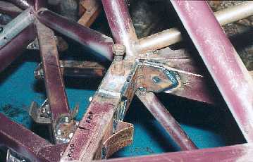Engine restraining cable bracket.