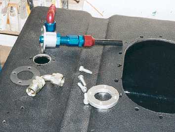 The fuel Return For The Petrol Tank.