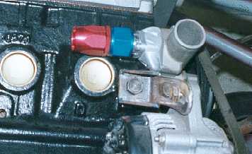 Adapter for a dash 12 fitting on the back of the water pump.