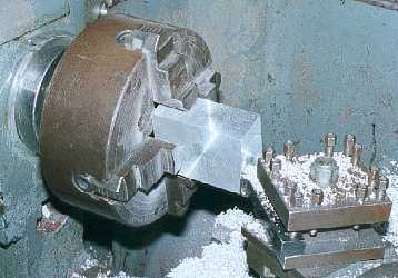 Facing the sides of the aluminium block.