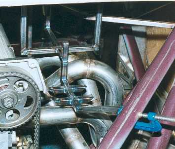 Header tank and coil mounting bracket.
