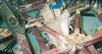 Spreader plate for the coil over mountings