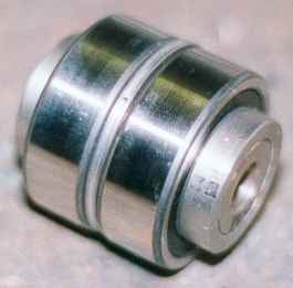 An assembled rocker bearing assembly.