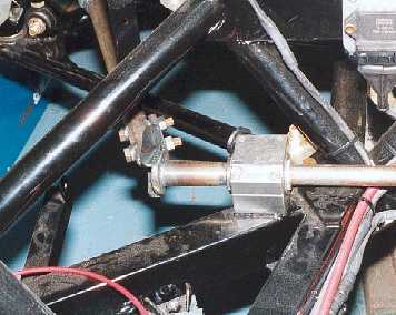 Cut down end of the torsion bar.