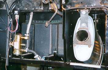 Silencer, fuel pump and tank