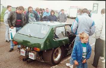Crowd around the car